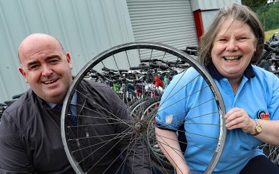 school bikes africa wheel volunteers smiling