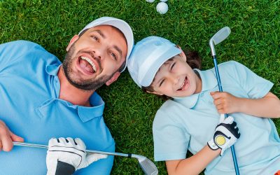 golf boy father grass golf laughing smiling playing